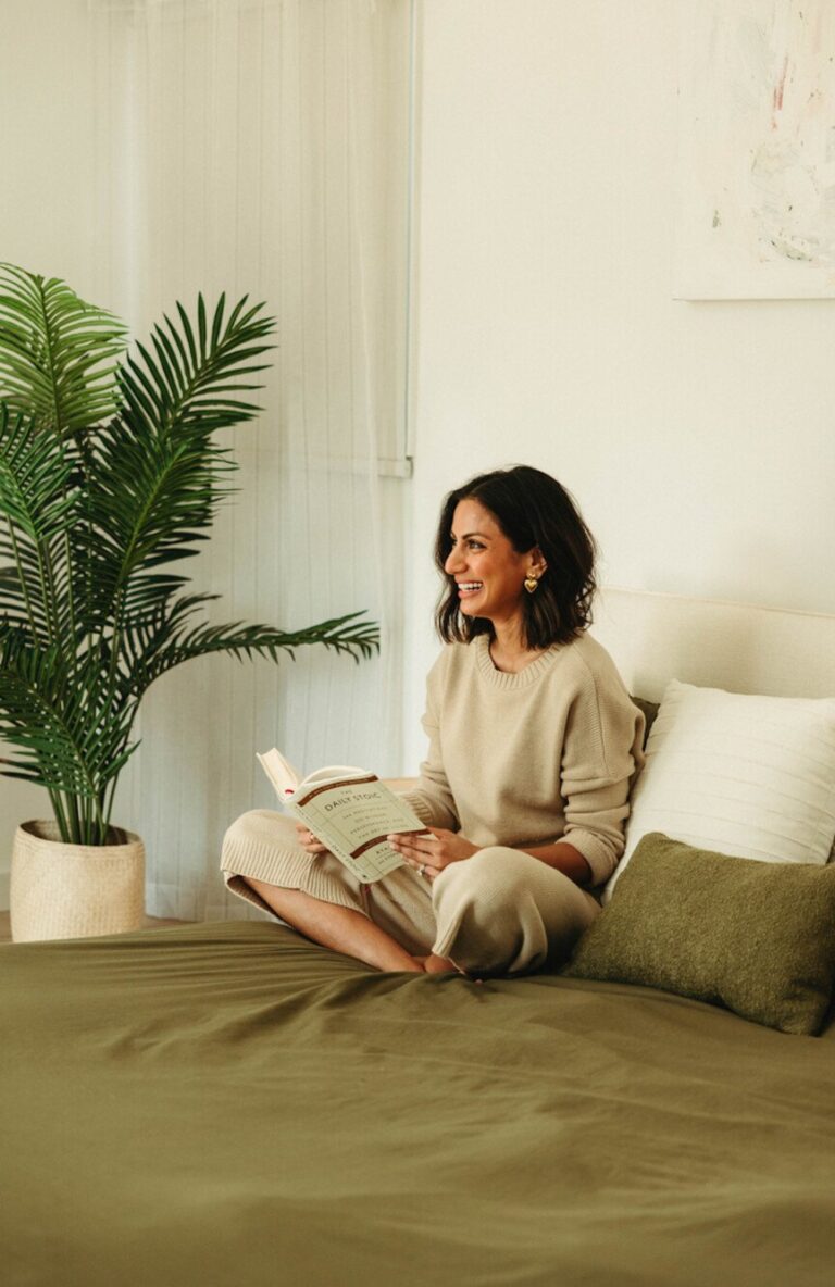 woman reading in bed 865x1334